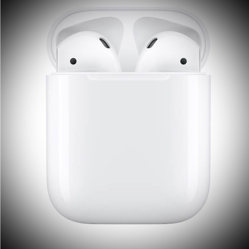 Apple White Earbuds with charging case.